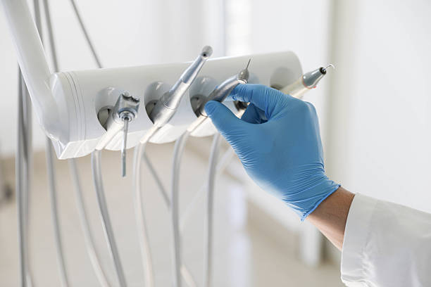 Professional Tooth Extraction technician working in Albion, MI